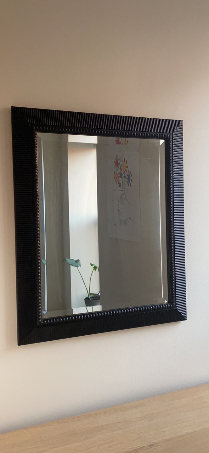 Mirror with black frame