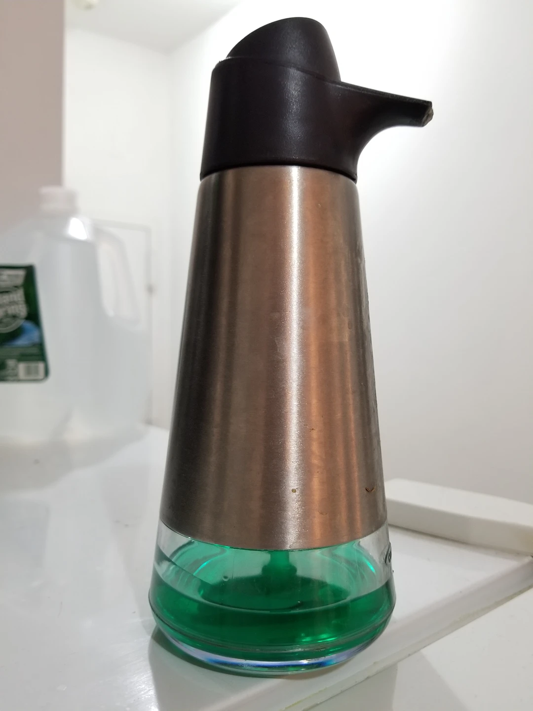 Dishwasher detergent dispenser