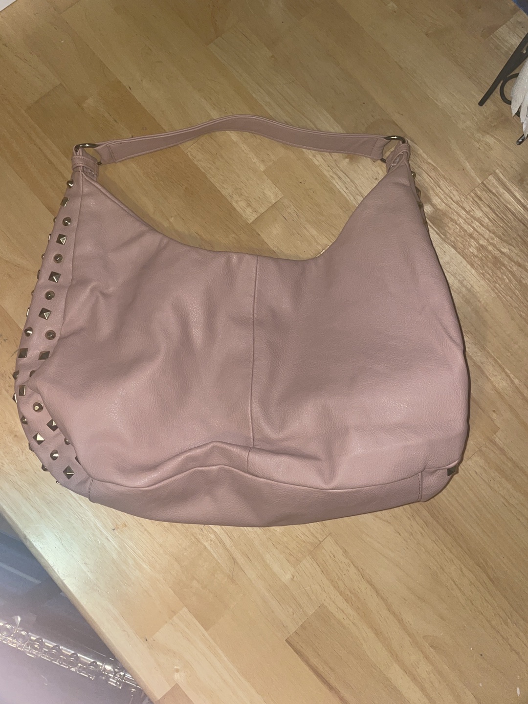 New, unused pink purse with studs