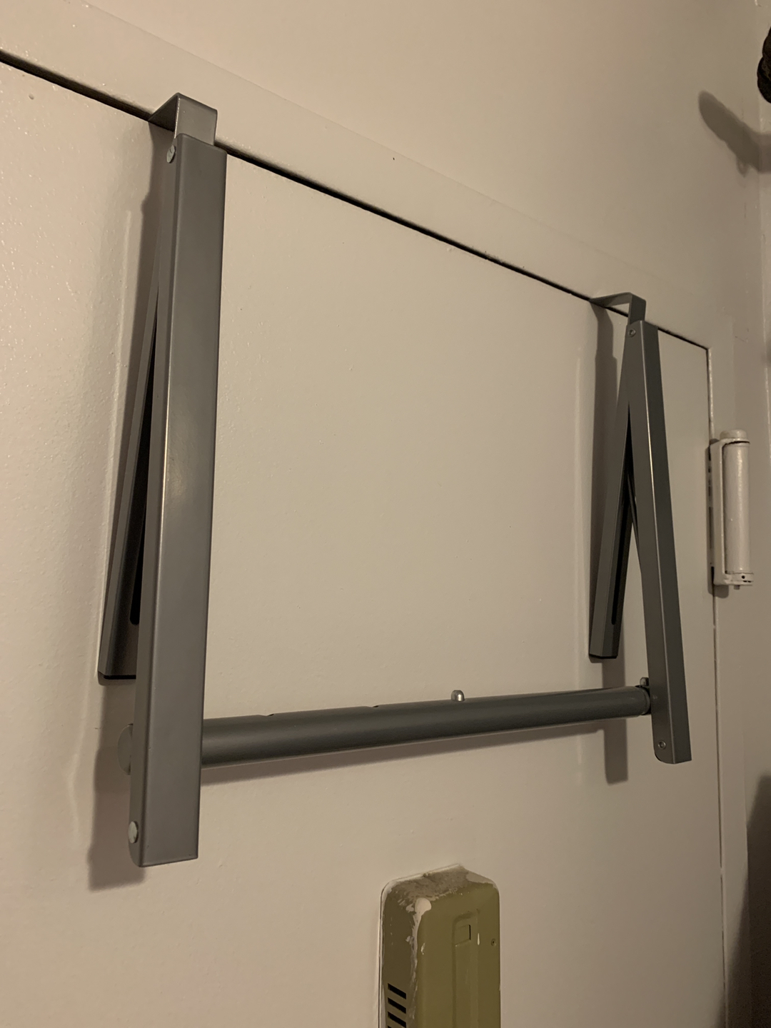 Clothing rack - hangs from door and collapses  - photo 2