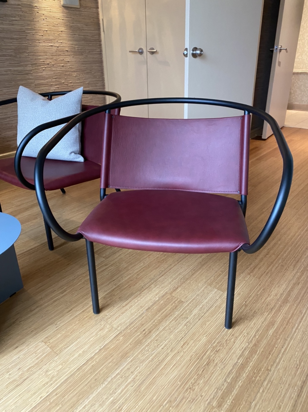 Red / maroon modern leather armchair w/ black frame lounge chair