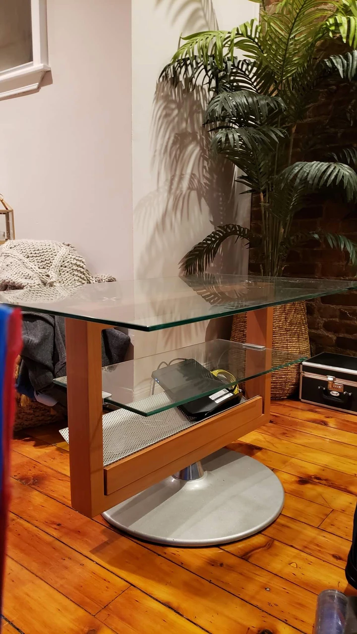 Gorgeous glass/wood swirling TV stand