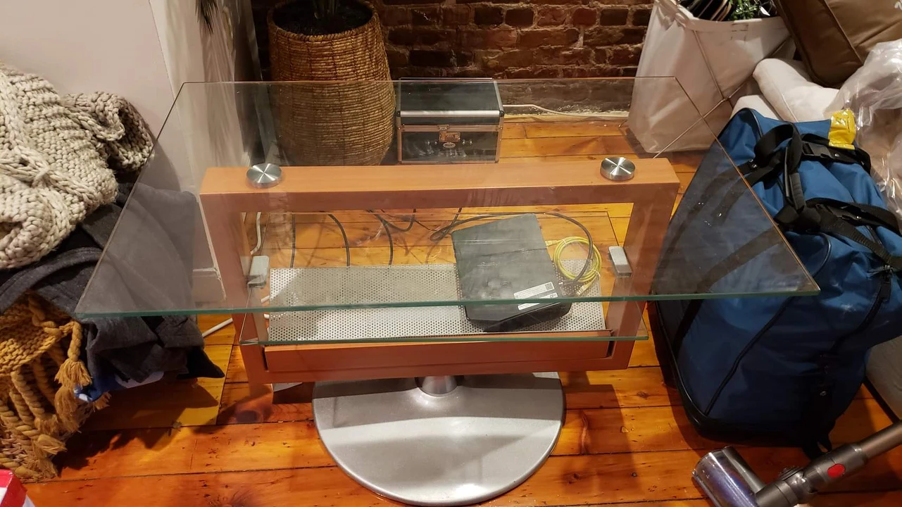 Gorgeous glass/wood swirling TV stand - photo 2