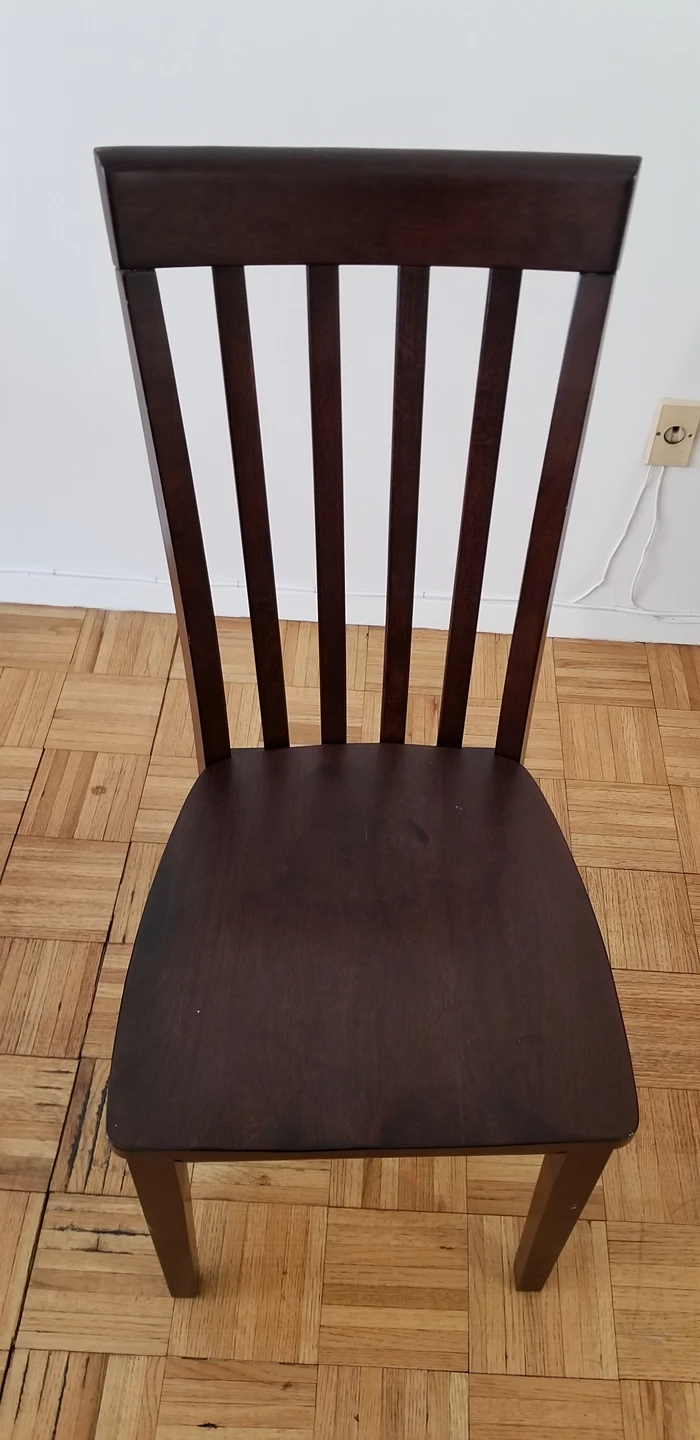 two wooden dining chairs - photo 2
