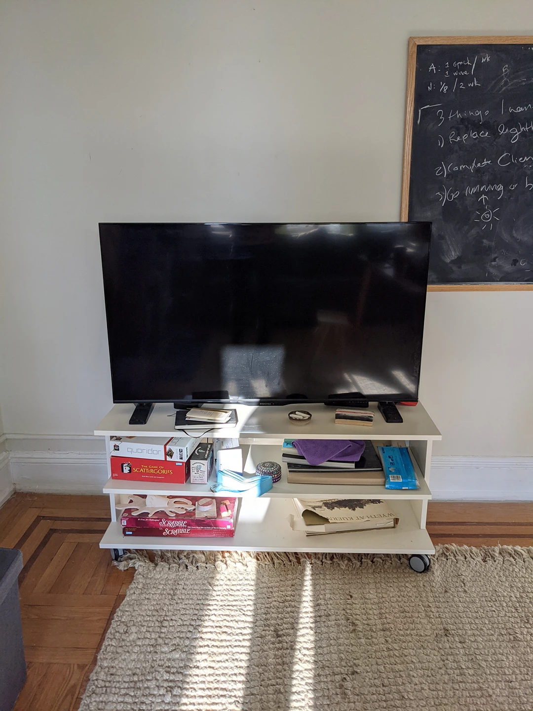 tv with apple tv and stand
