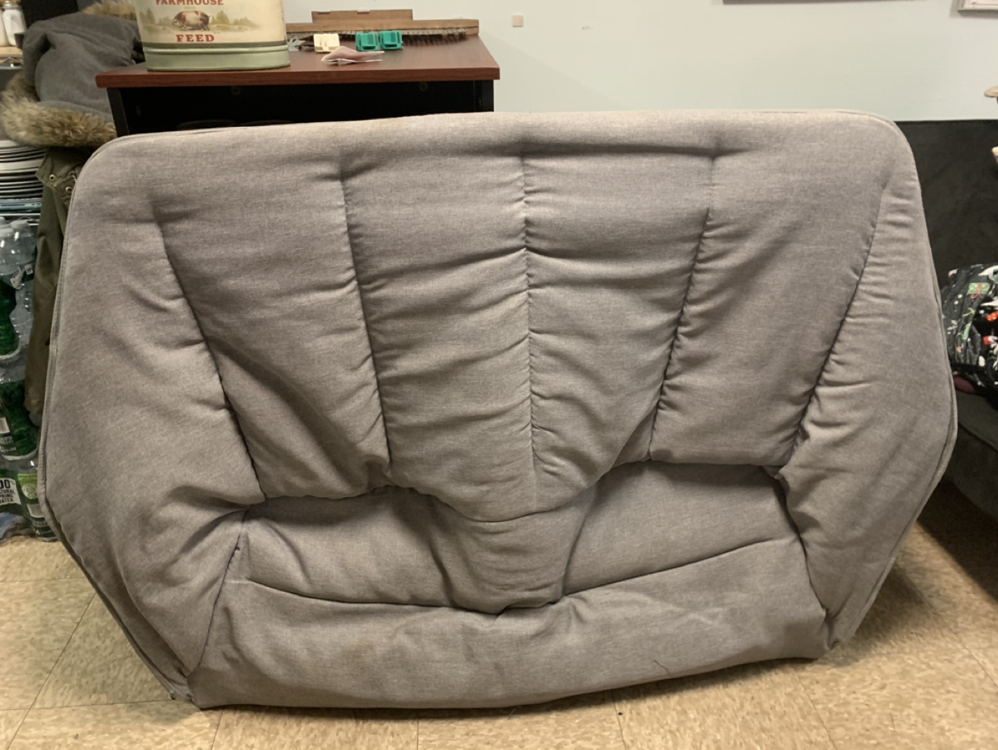 Gray folding loveseat. 