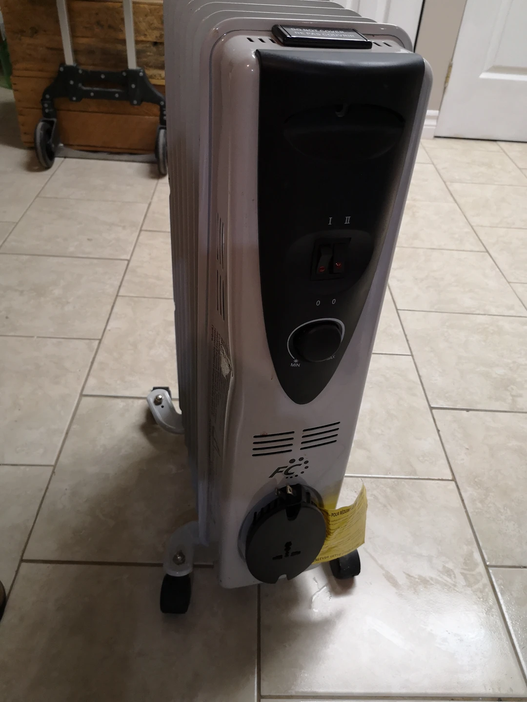 Oil filled heater with wheels, white image indicator(4)