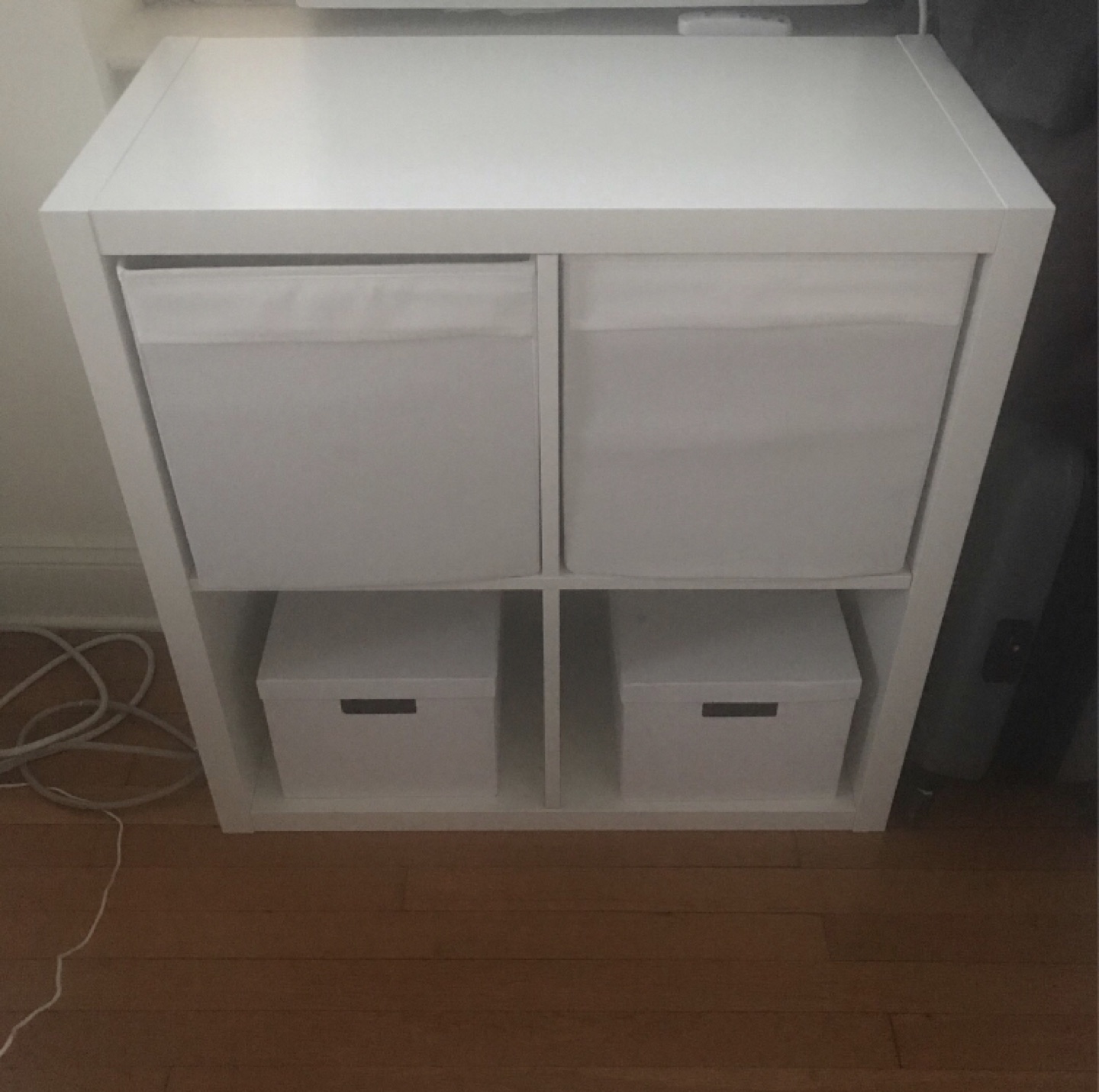 Ikea shelf unit with boxes