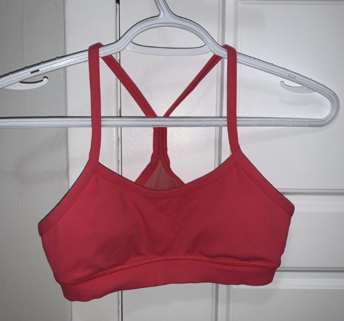 Pink Lululemon sports bra