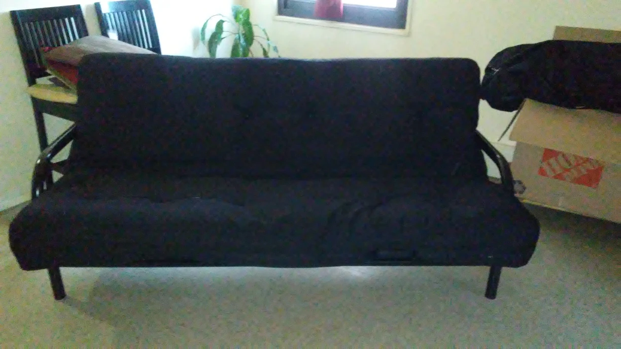 Full size metal frame with tufted mattress