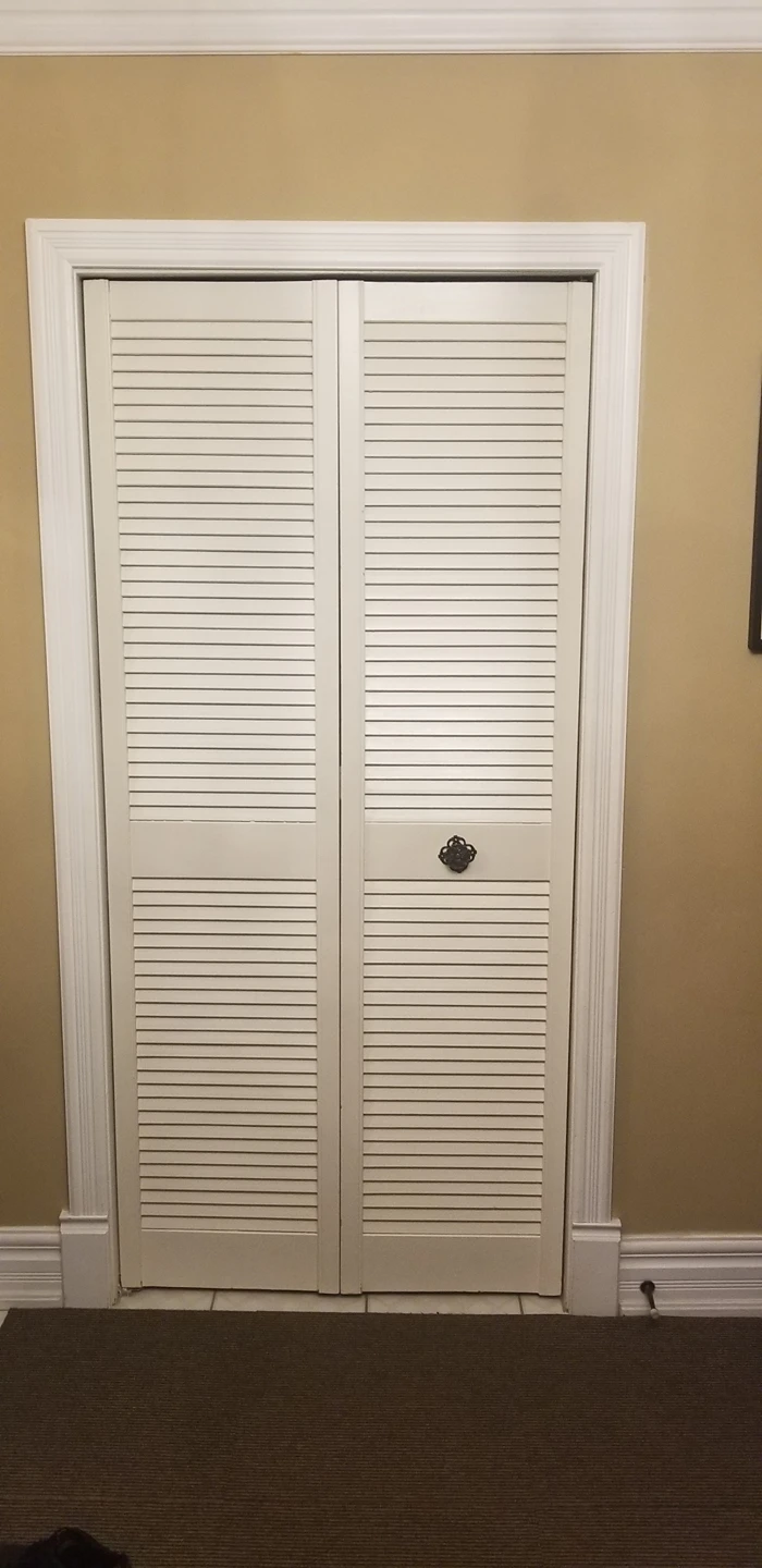 Louvered Bi-fold wood Door