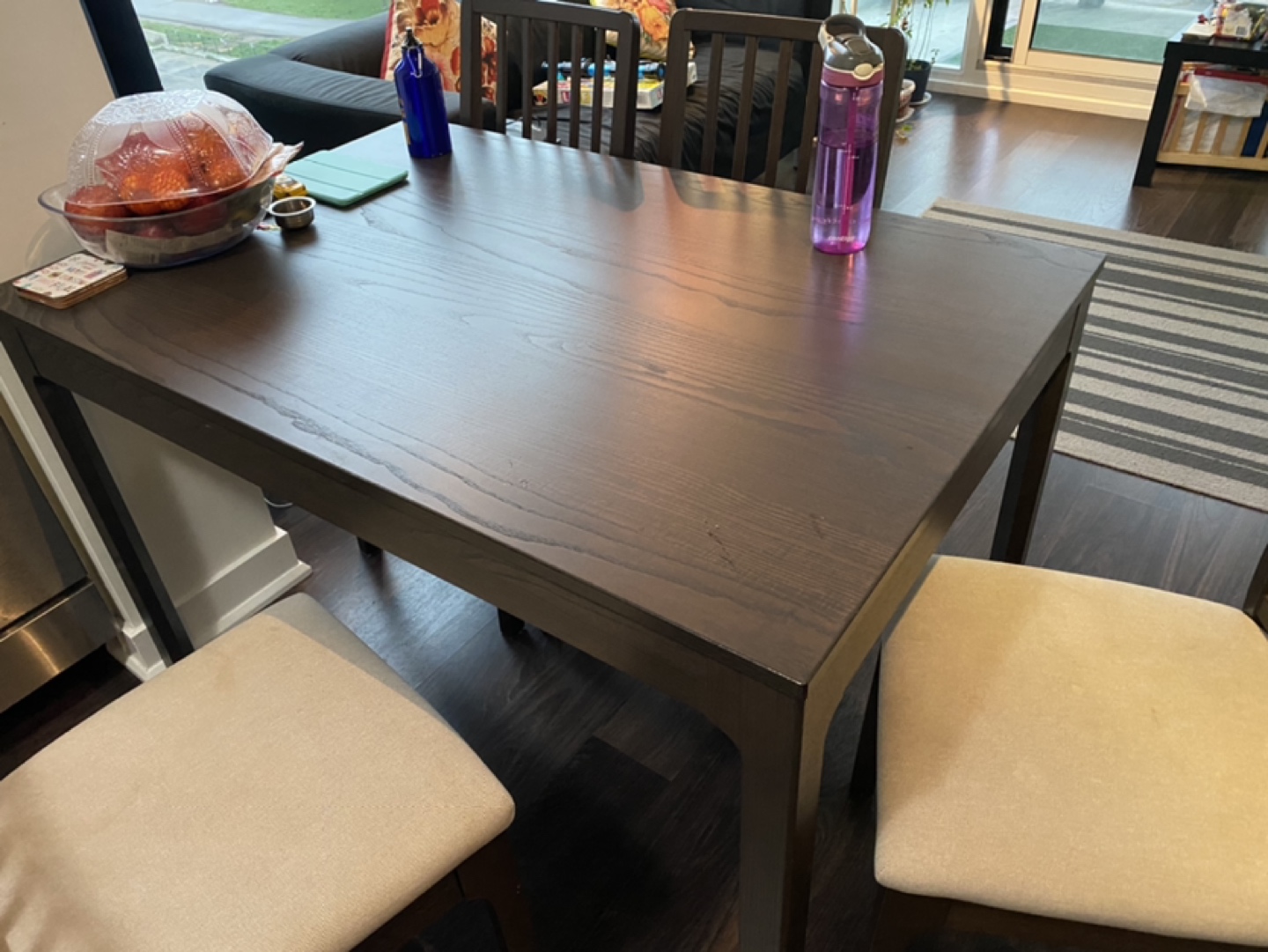 IKEA extendable dining table with four chairs 
