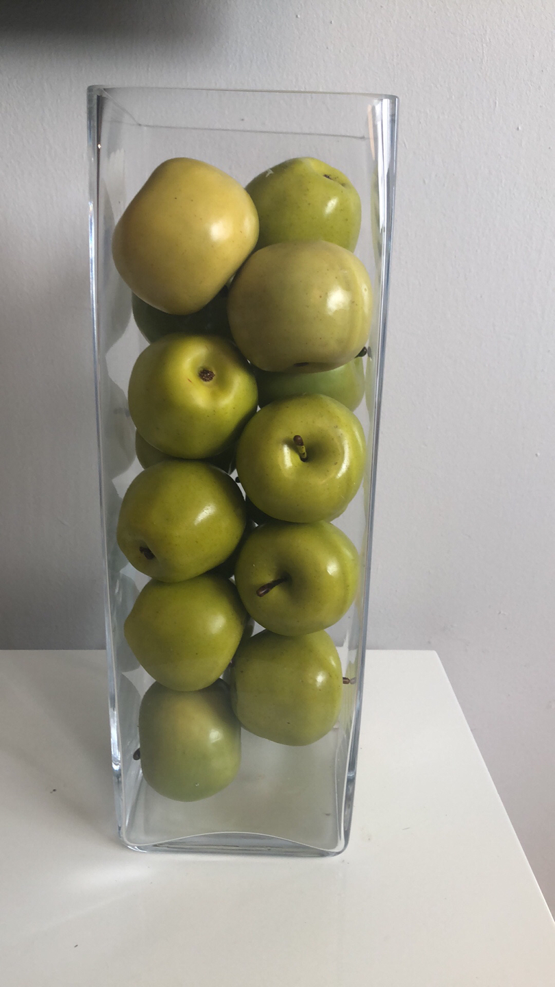 Glass vase with apple thumbnail