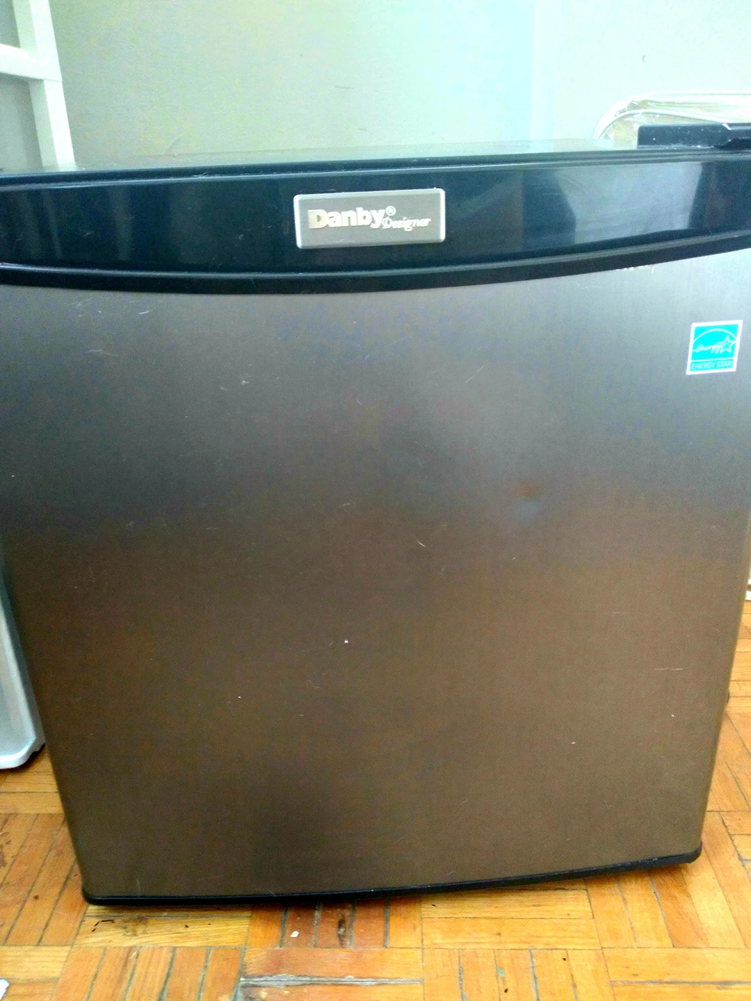 Silver Danby mini fridge