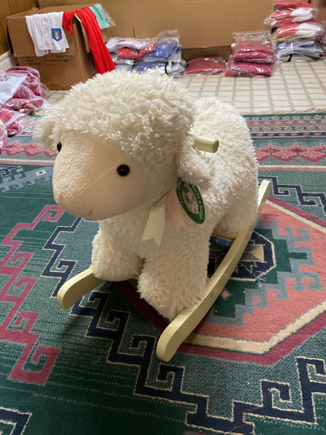Kids ride on rocking horse in sheep style 