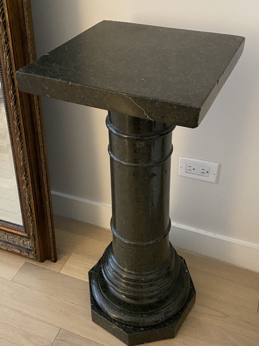 Black marble pedestal stand