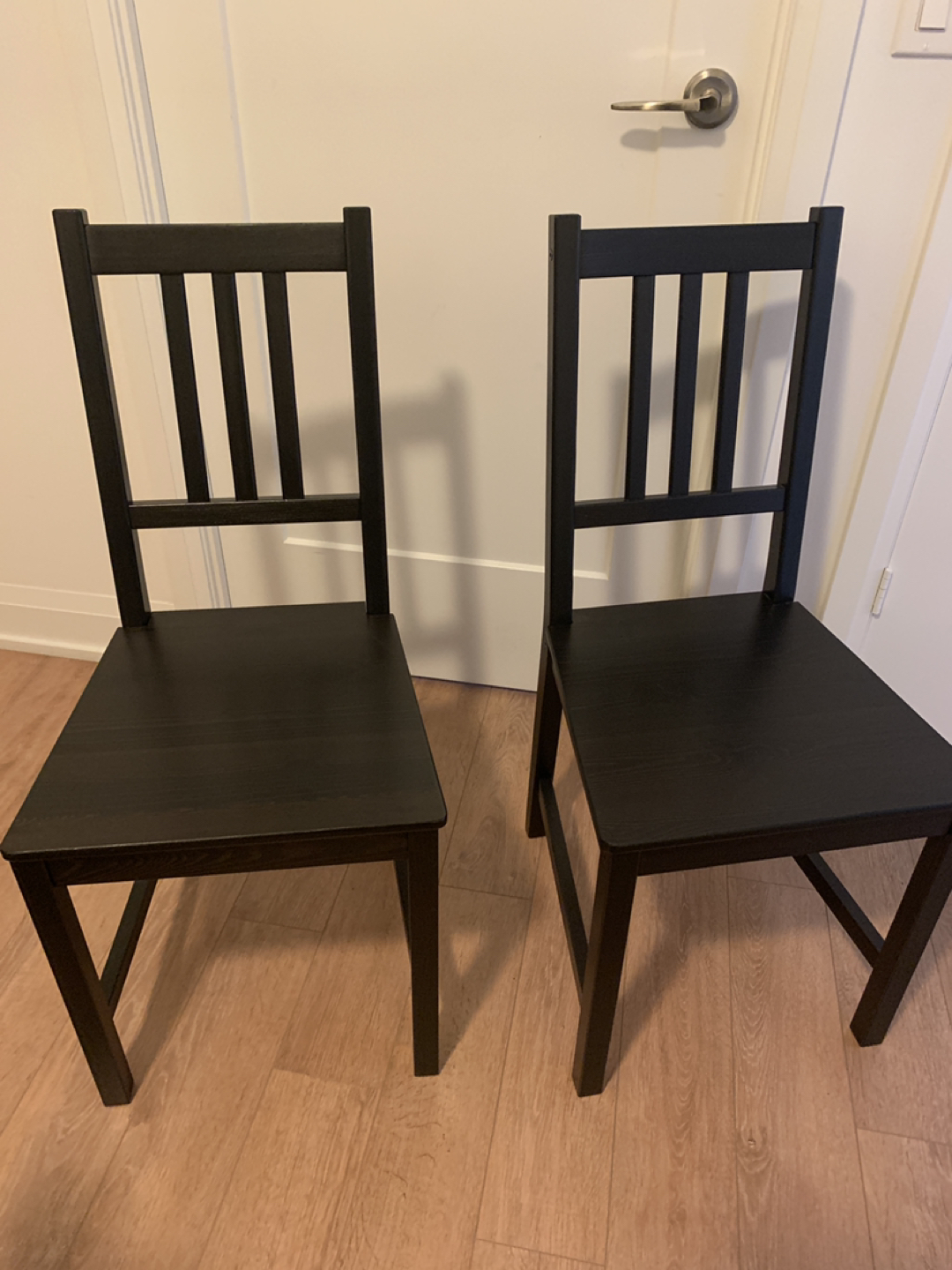 A set of two dining chairs 