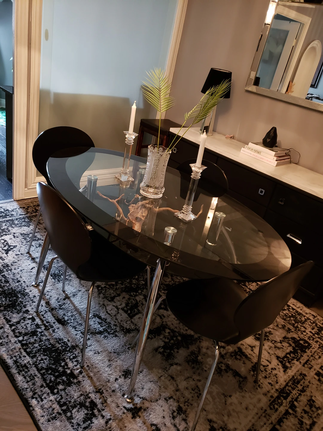 Glass table and black wood chairs thumbnail
