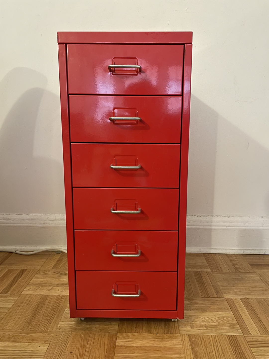 Red IKEA metal cabinet