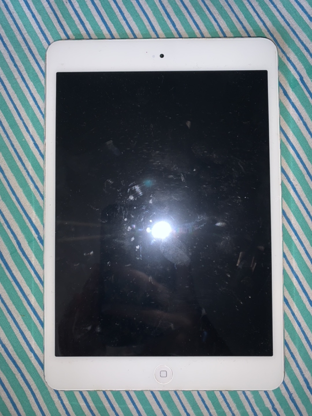 Old iPad Mini With Protective Case. thumbnail