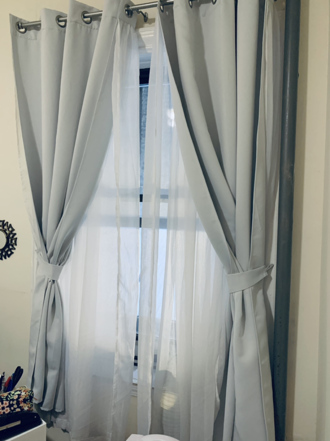 Grey blackout curtains with sheer white panel 