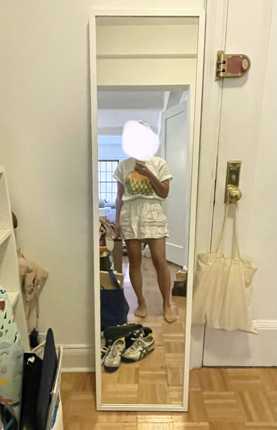 Full length white frame mirror