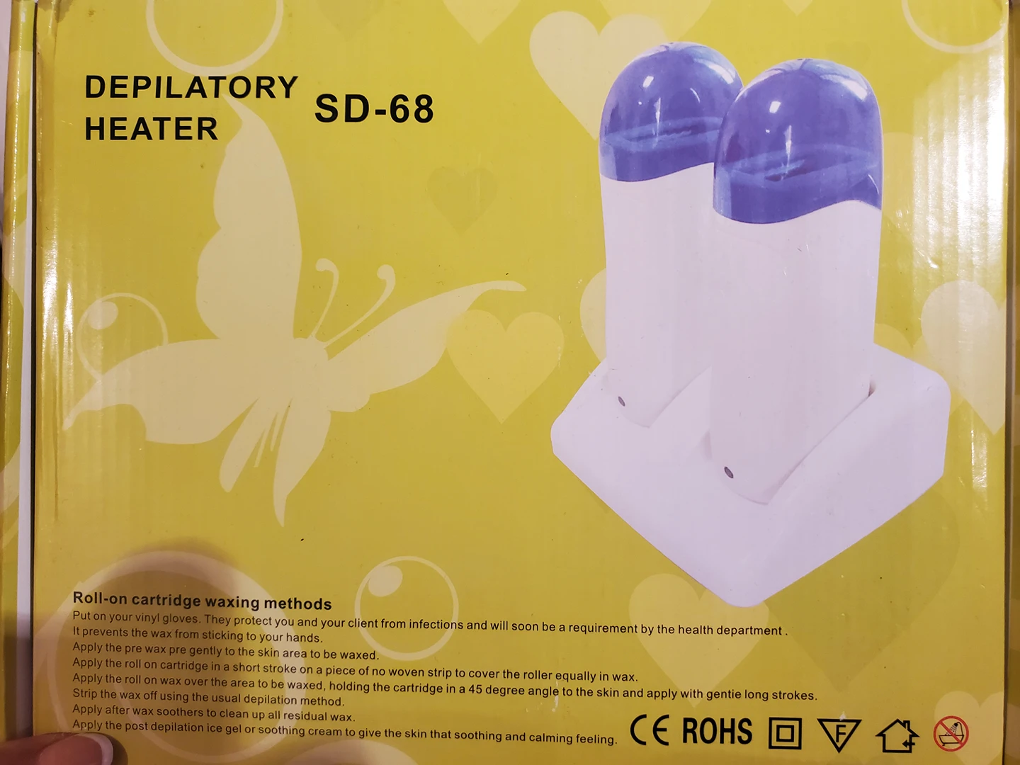 Deplatory heater for* waxing *