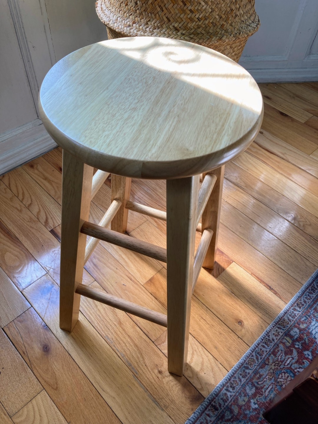 24-inch square leg barstool with Natural finish.