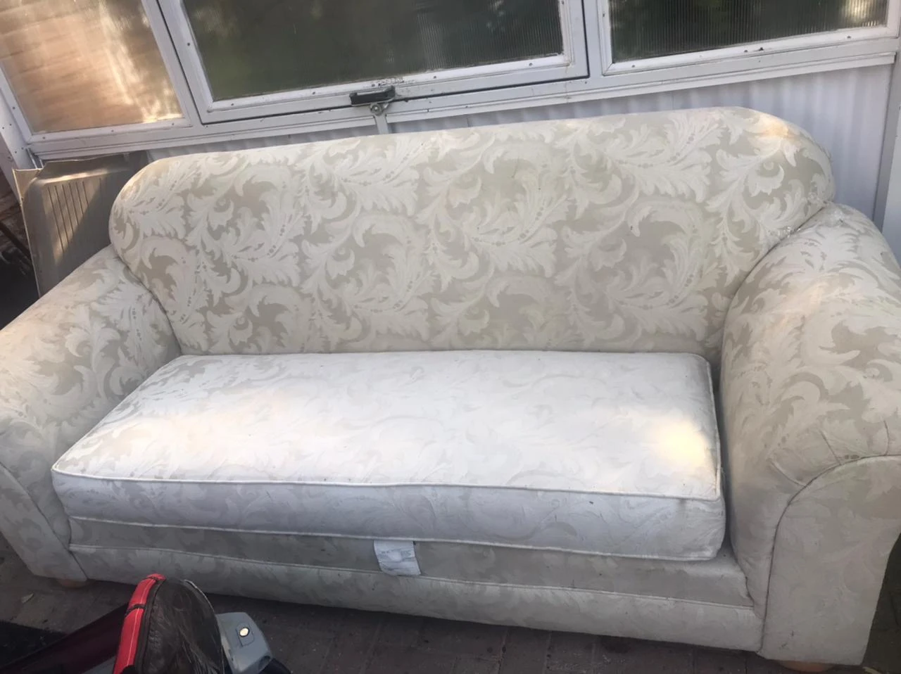 3 seater white sofa.