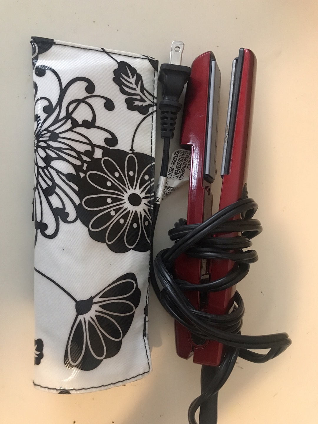 Travelling hair flat iron