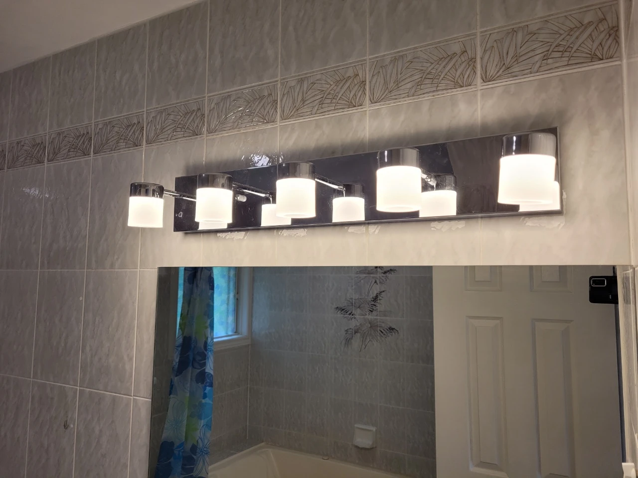bathroom vanity, sink, faucet, countertop, and the lighting - photo 3