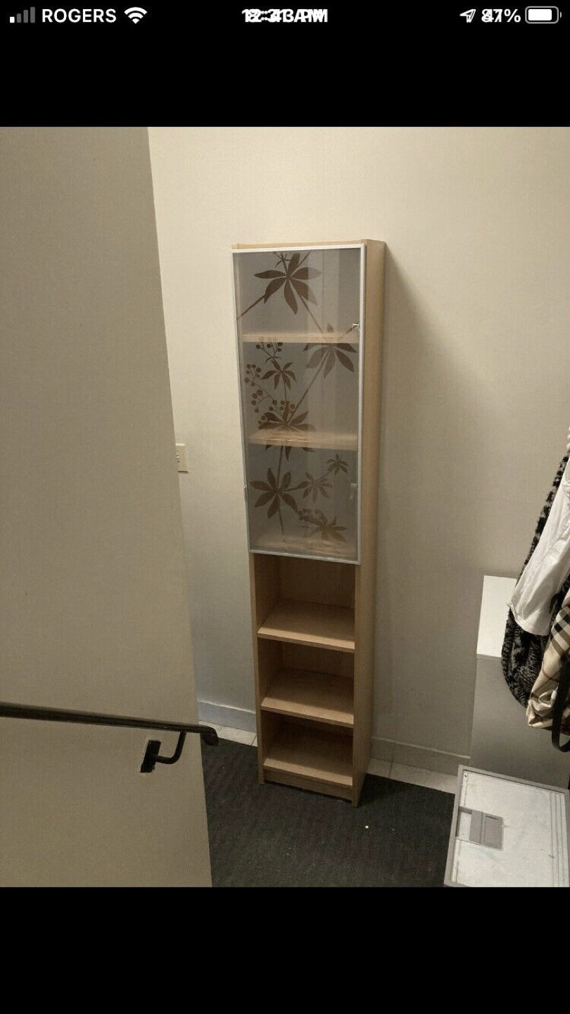 Tall ikea cabinet with decorative glass door 