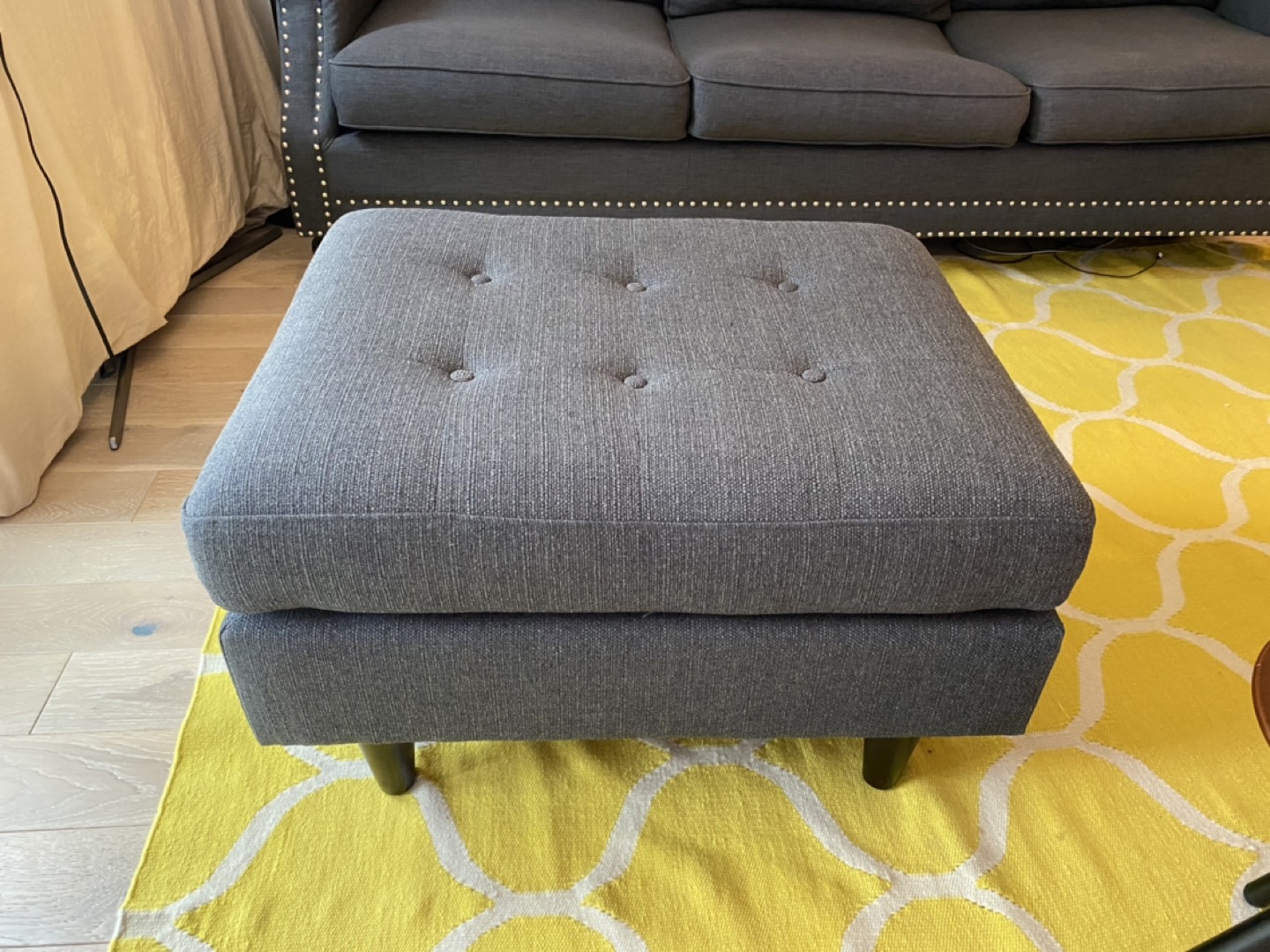 Dark grey ottoman 