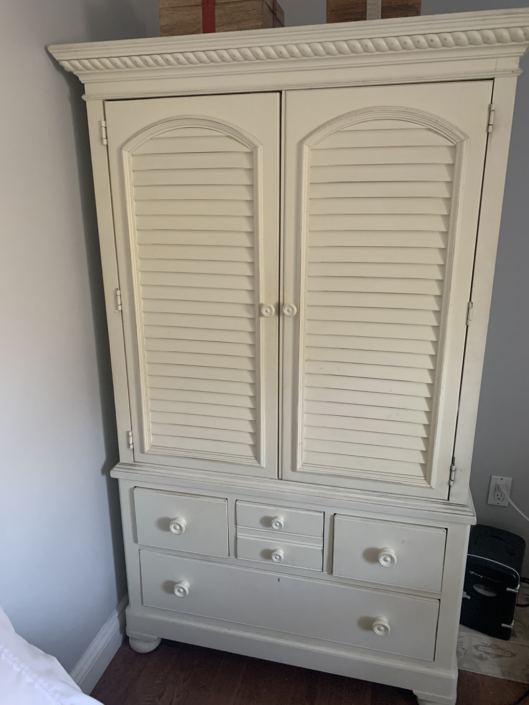 Off white children’s armoire and side table