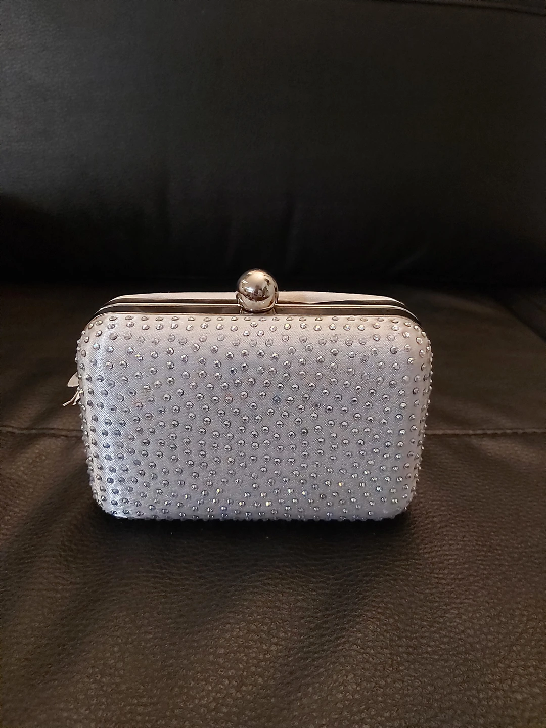 Evening clutch with pave diamonds. image indicator(4)