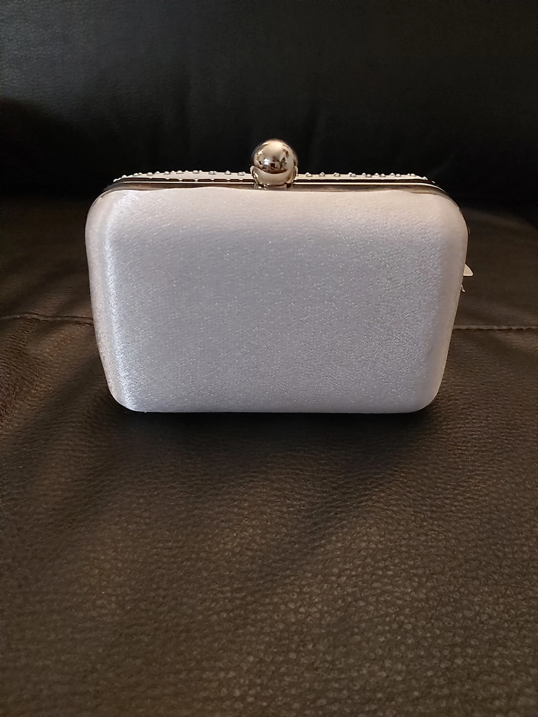 Evening clutch with pave diamonds. image indicator(5)