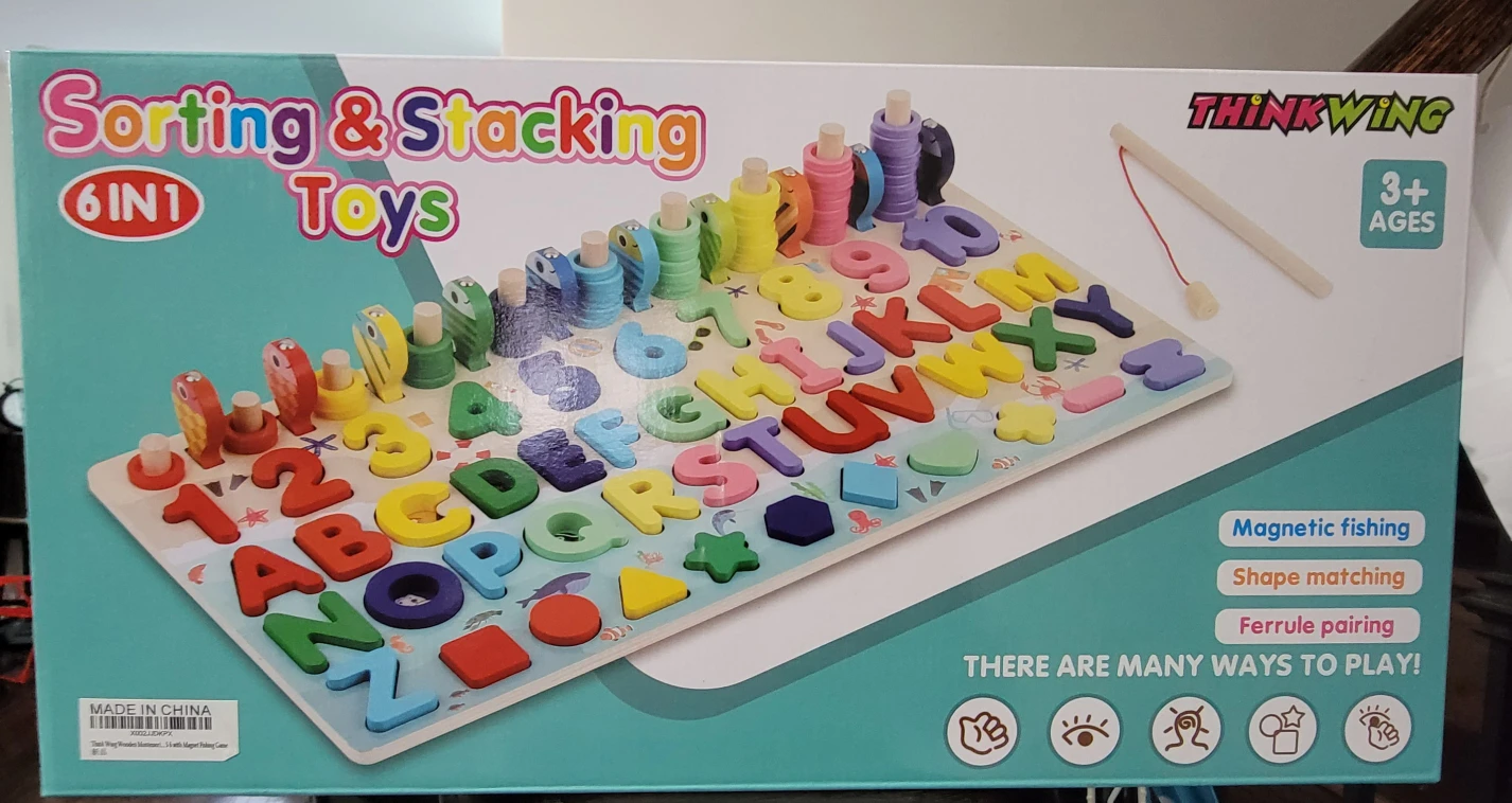 BNIB Wooden Sorting and Stacking toy thumbnail