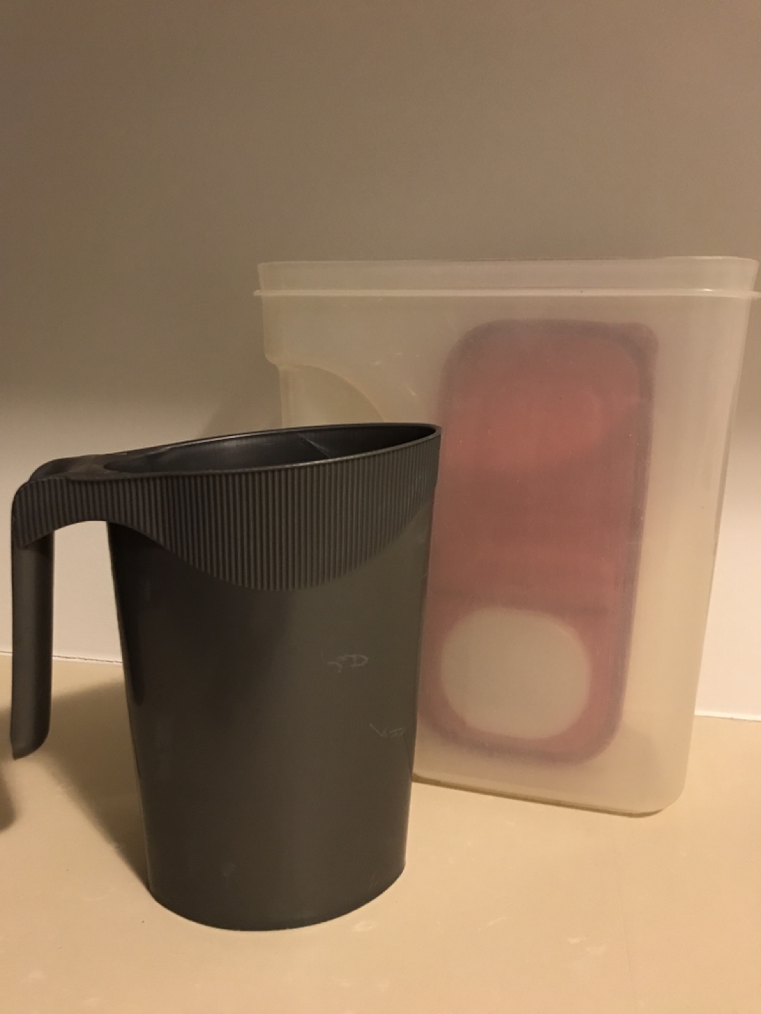 Various kitchen items (strainers, containers)