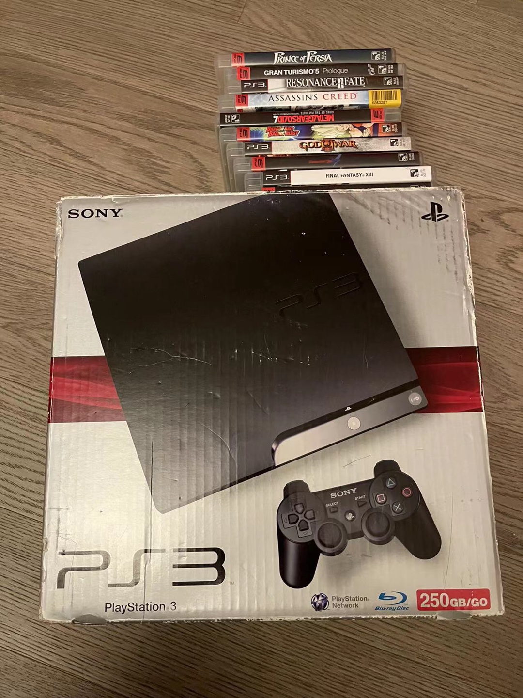 Play Station 3 (PS3) 250G with 2 controllers and 10 games