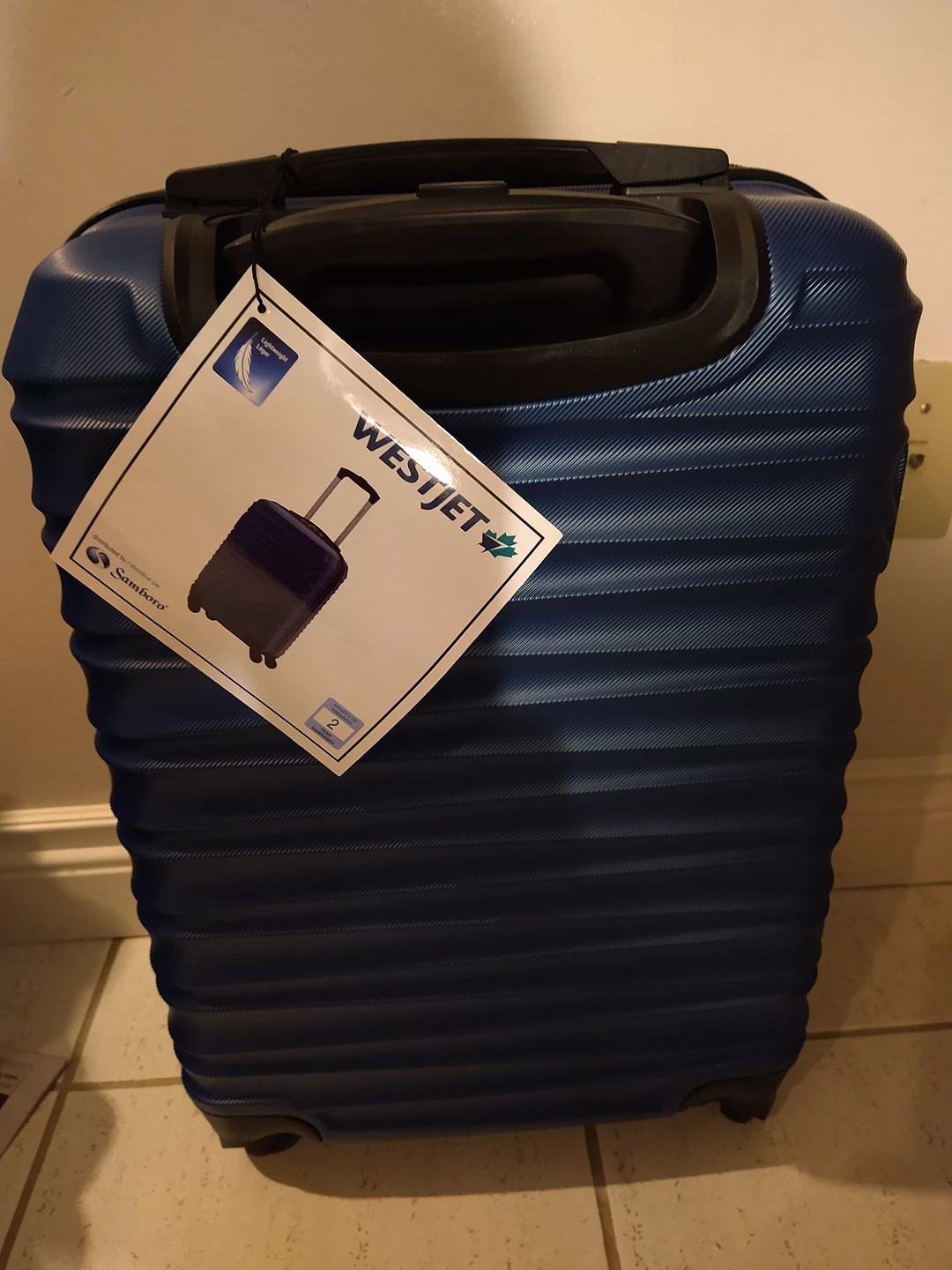 WestJet In-Flight Luggage. Spinner Trolley - Teal Color thumbnail