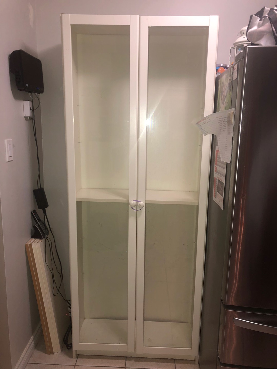 Upright glass cabinet