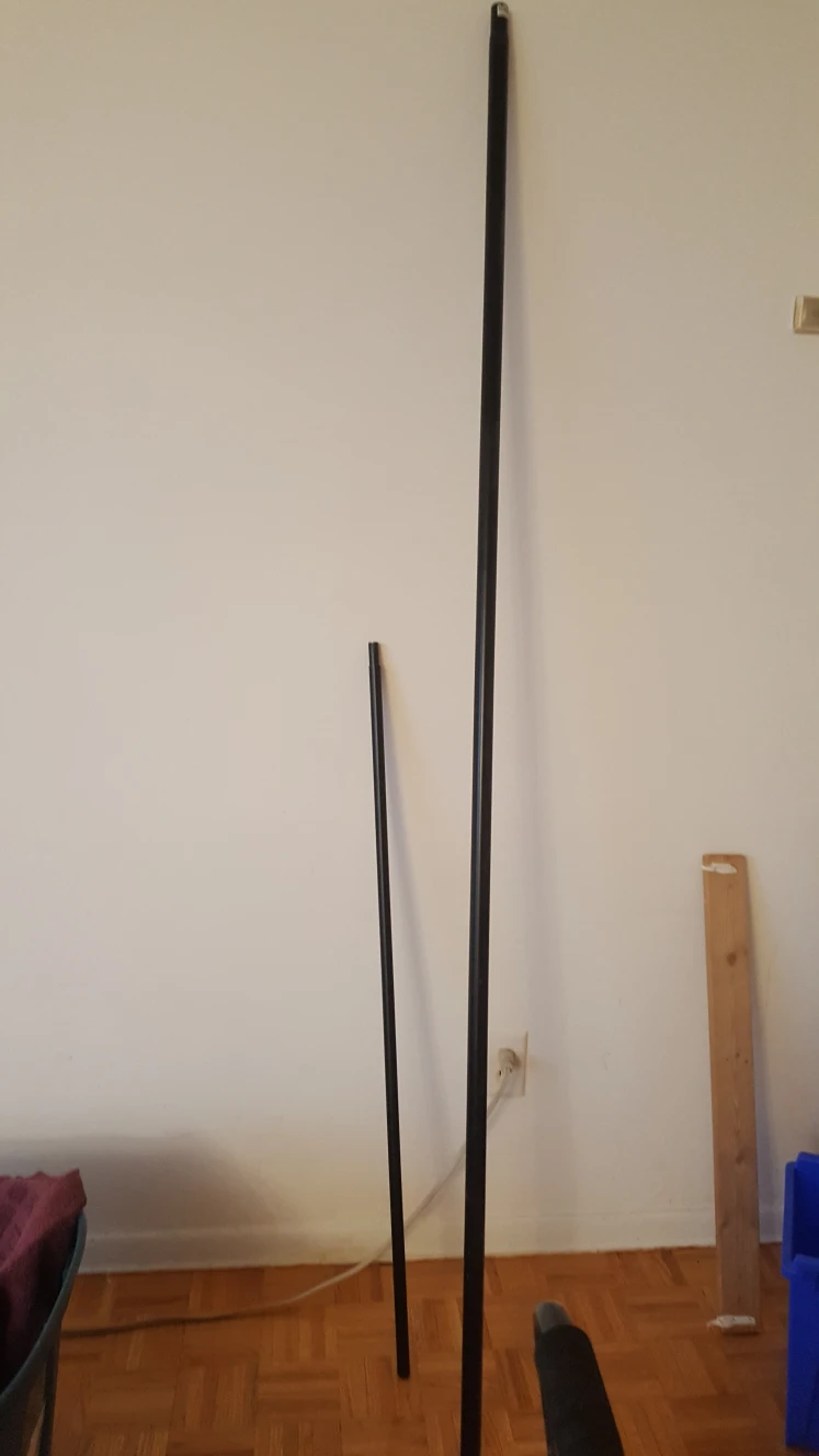3 curtain rods and 4 curtains
