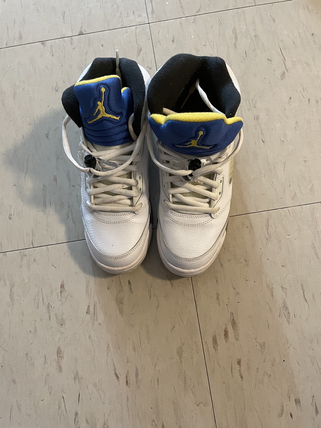 White and blue and yellow Jordan