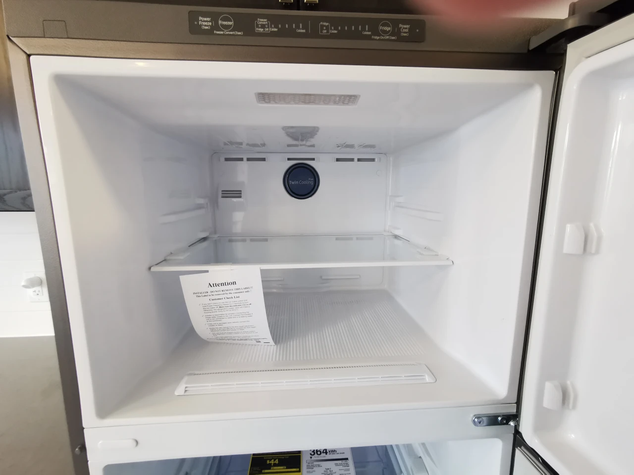 *moving sale* brand new Samsung 29" top mount refrigerator - photo 3