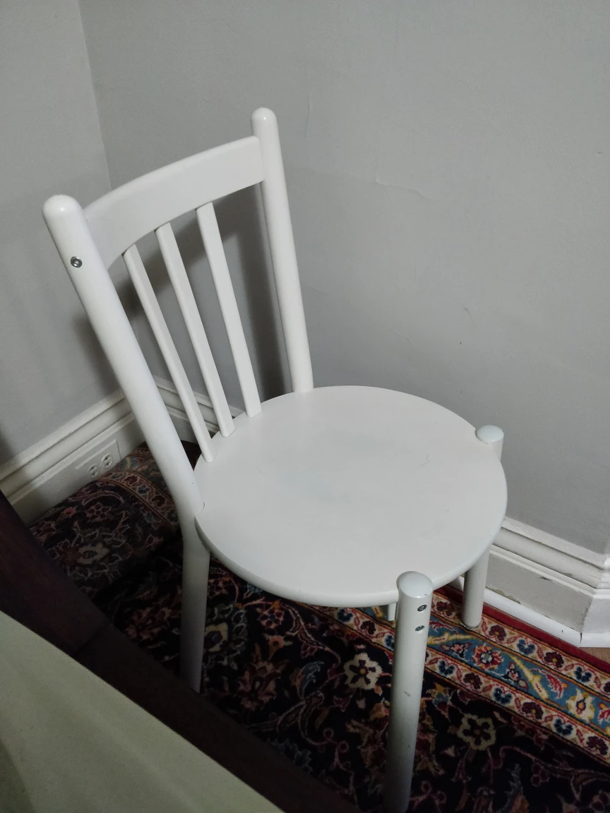 Single White Wooden Chair