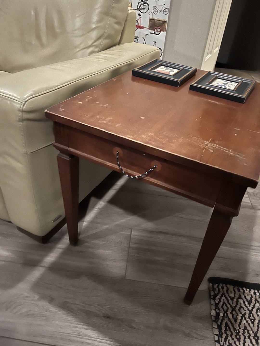 End table and pictures . With delivery