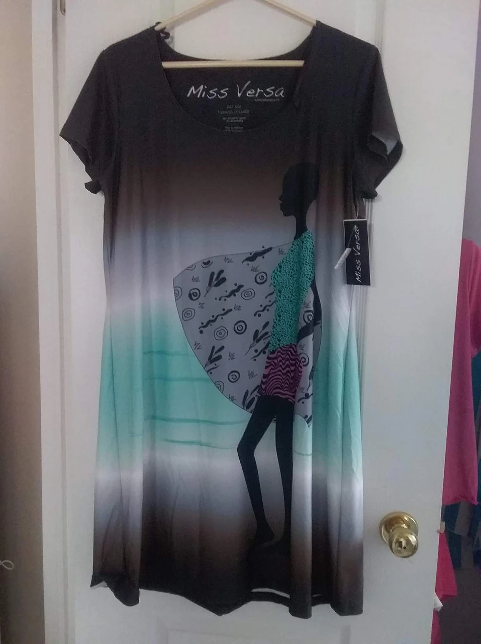 woman's summer dress with tags still on