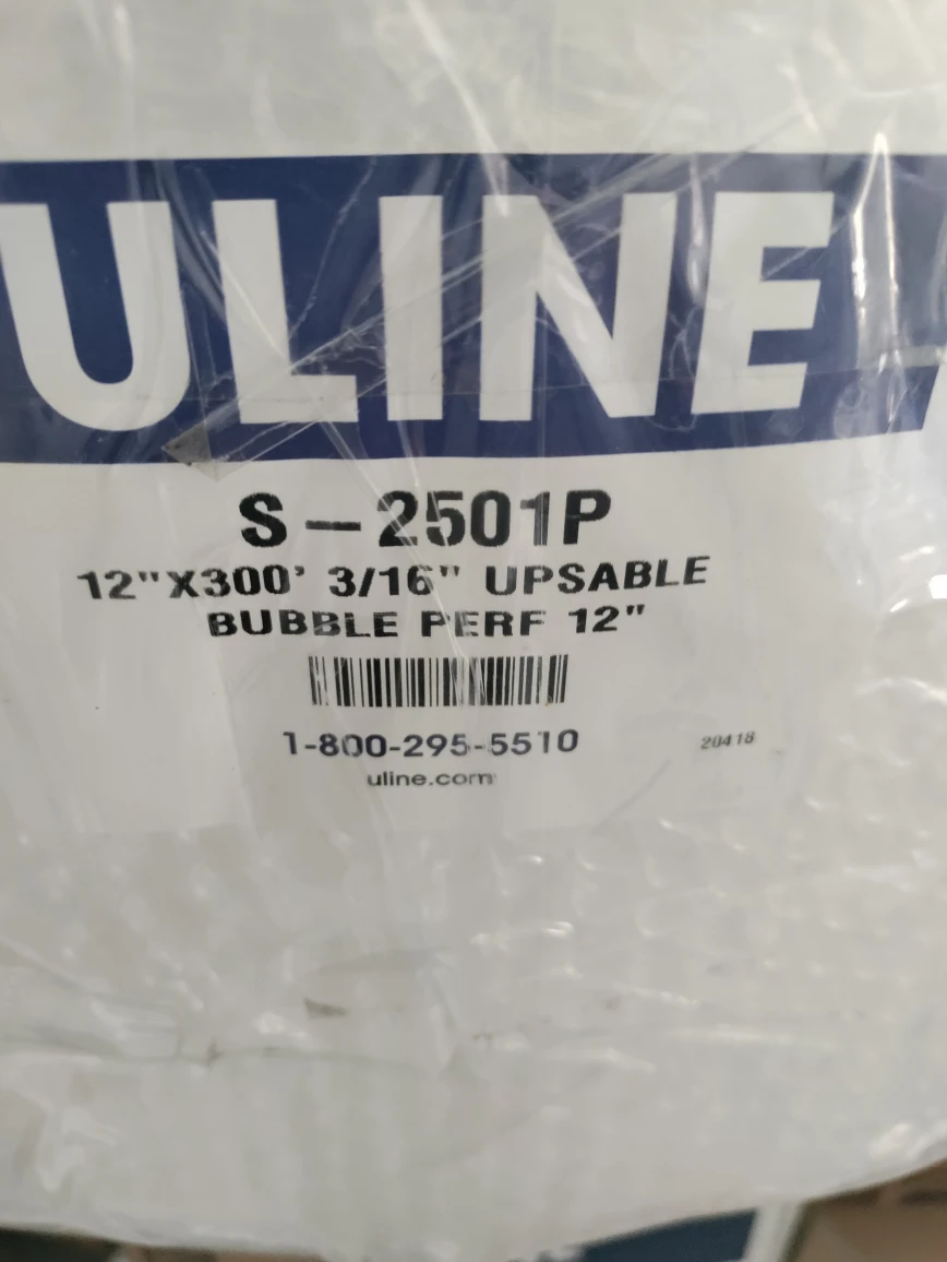 Packing supplies: foam, bubble wrap, shrink wrap, tape dispenser