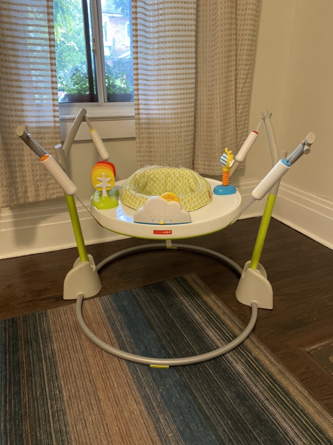 Skiphop explore and more bouncing exersaucer