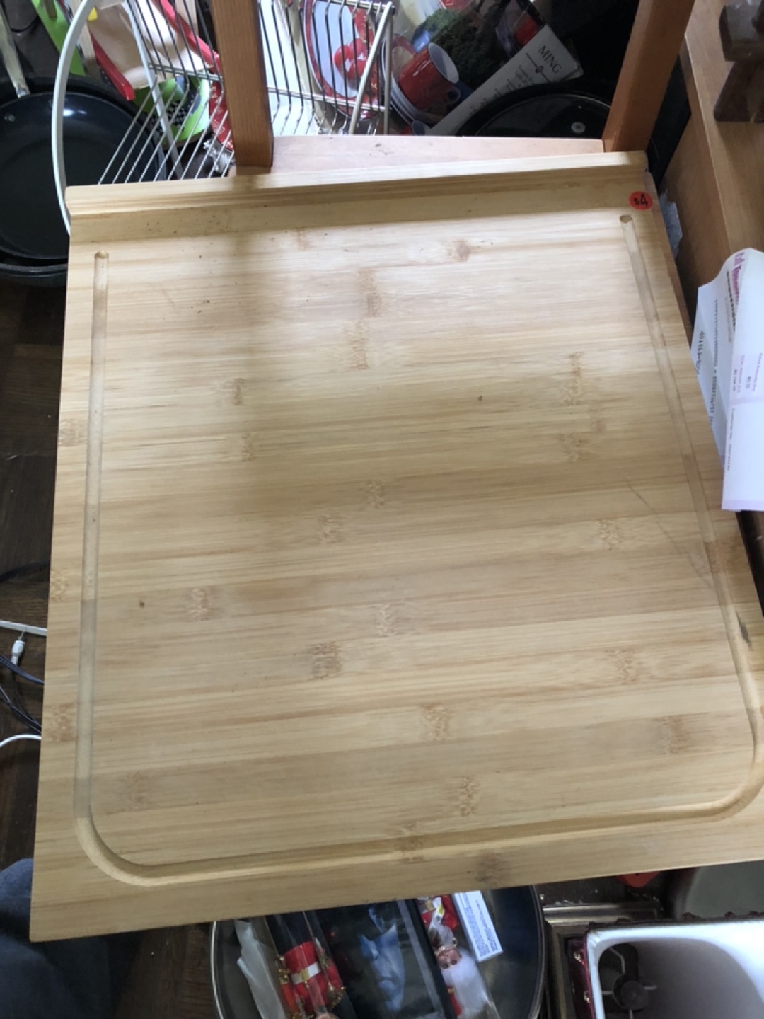 Wooden tray over the oven.